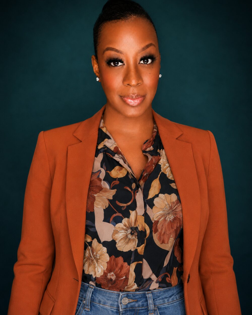 AI-created portrait wearing an orange blazer